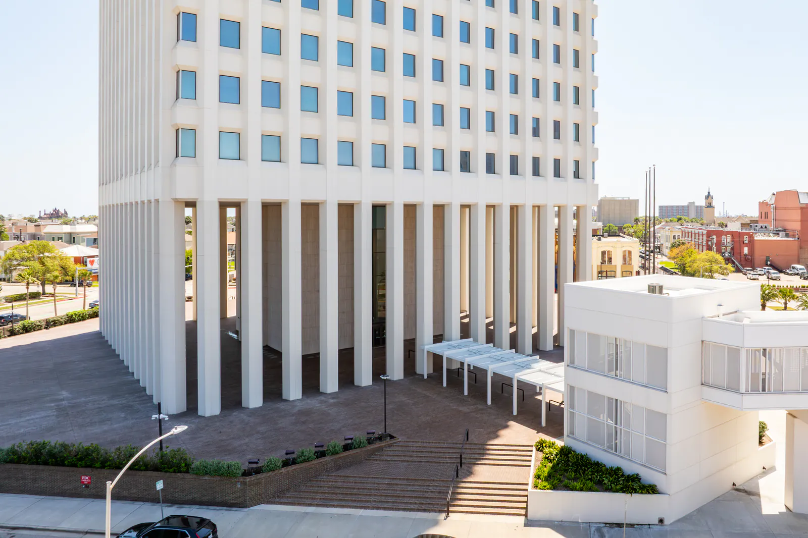 Tenant Moves and Pricing Details Emerge After One Moody Plaza Changes Hands